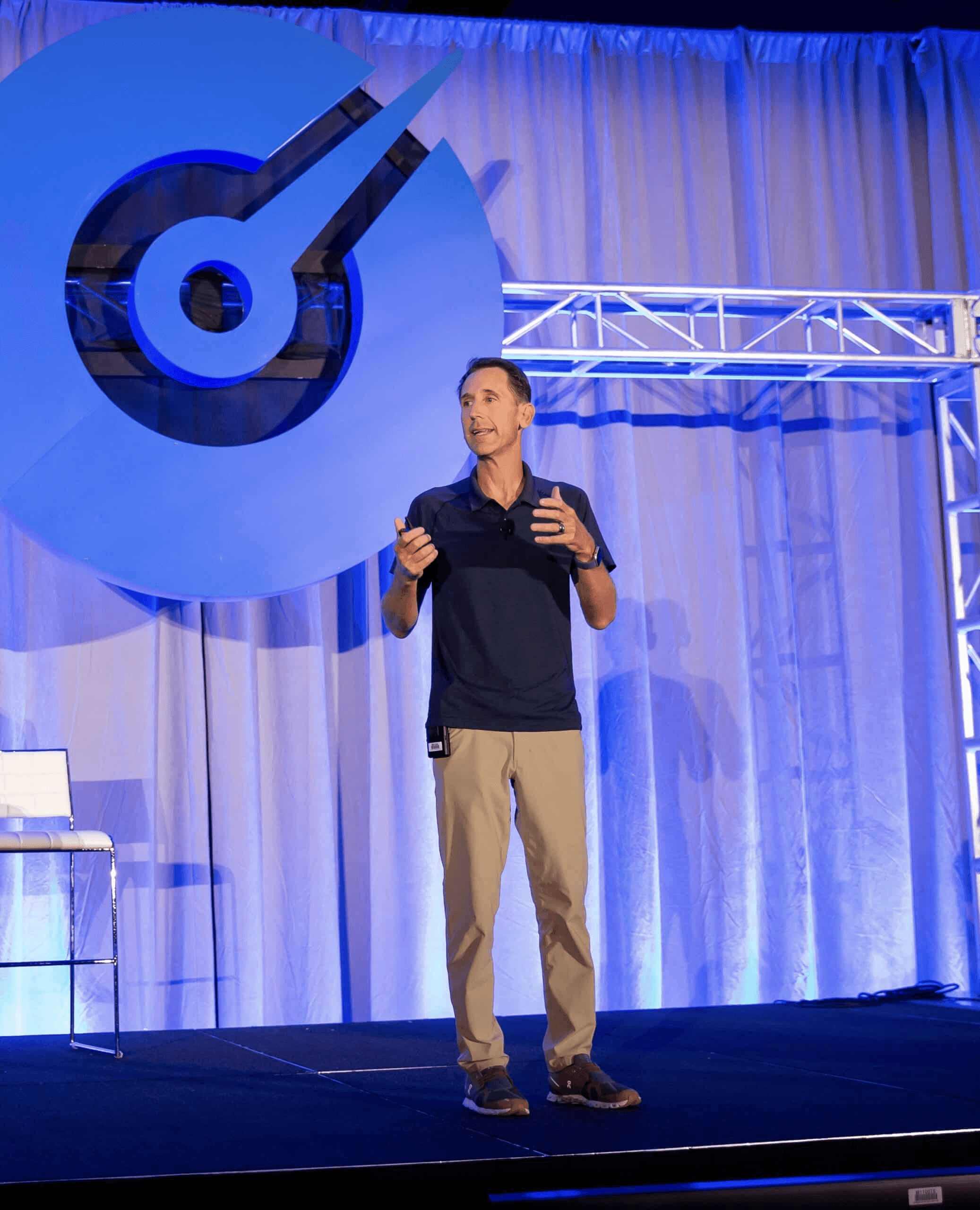 Steve Welch speaking on stage